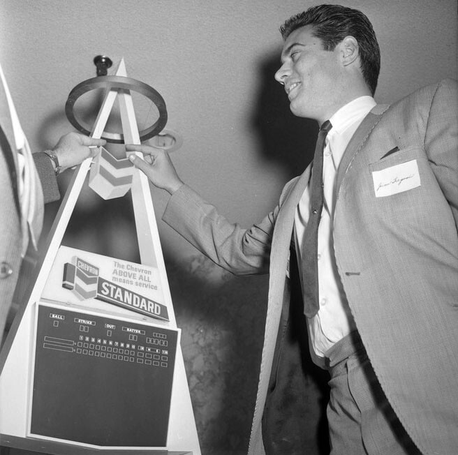 Angels shortstop Jim Fregosi with a model of the Big A scoreboard. The team's players supported the move since they found Dodger Stadium's quick infield and pitcher-friendly dimensions ill-suited to the team's style.