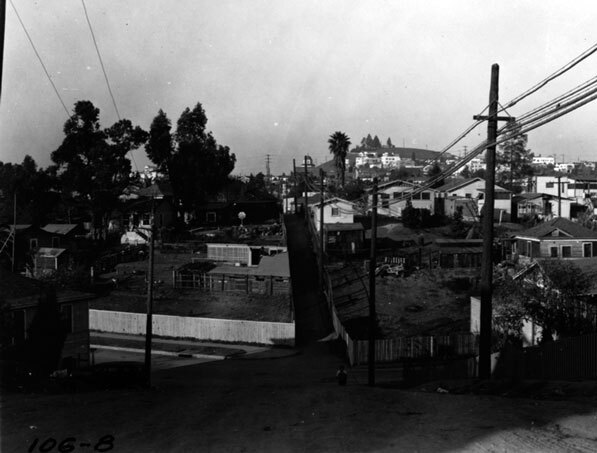 Engineering notebook photoprint looking north along the eastern boundary of the City of Los Angeles, 1937. To the left is Los Angeles, to the right is unincorporated East Los Angeles. Courtesy Automobile Club of Southern California.