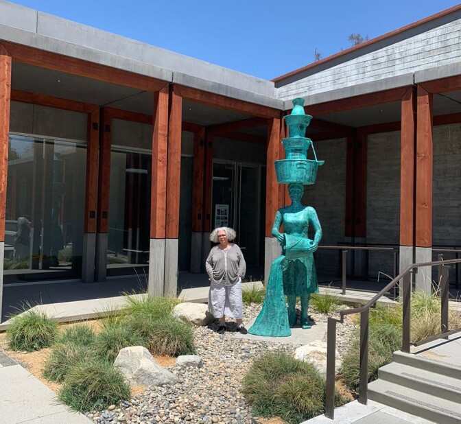 Alison Saar next to "Imbue" (2020) outside the Benton Museum of Art | Ian Byers-Gamber, Courtesy of the Benton Museum of Art at Pomona College, Claremont, CA