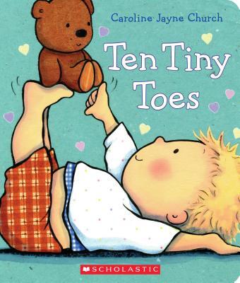 Book Cover of “Ten Tiny Toes” by Caroline Jayne Church. It is illustrated with a small child holding a teddy bear on his legs.