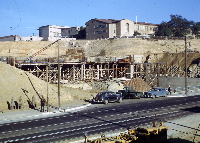Construction of the Hollywood and Harbor freeways required crews to cut artificial canyons through Fort Moore and Bunker Hills. Courtesy of the Herald-Examiner Collection - Los Angeles Public Library.