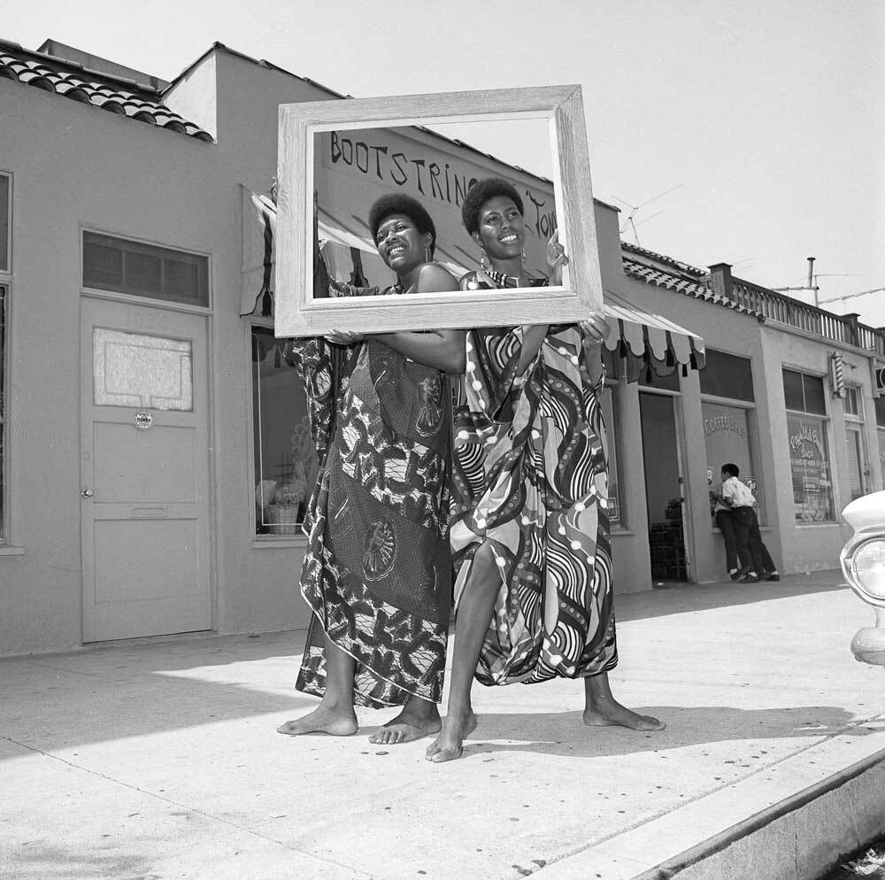 People showing off the Boostring clothing collection | UCLA, Library Special Collections,Los Angeles Times Photographic Archives
