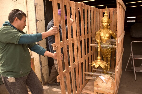 One of the Kinarra monuments being taken out of its air freight after travelling to South Gate, CA from Bangkok, Thailand | Photo by Curtis McElhinney