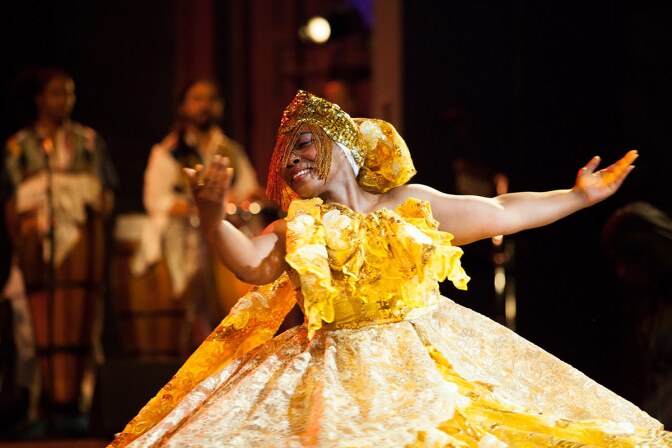 A Viver Brasil dancer in resplendent yellow dress | Courtesy of Viver Brasil