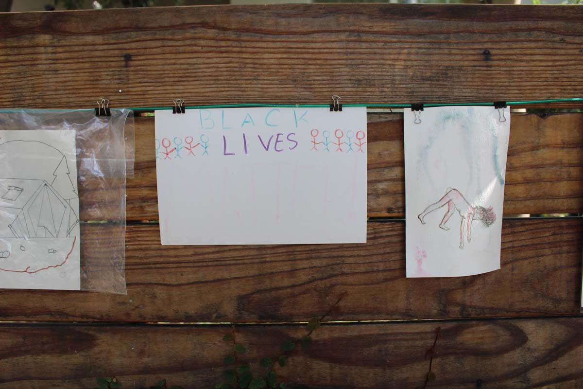 A Black lives matter drawing hangs on Dan Fields’ Los Feliz fence gallery.
