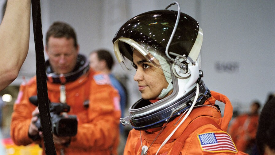 Astronaut Kalpana Chawla, STS-107 mission specialist, prepares to simulate a parachute drop into water during an emergency bailout training session in the Neutral Buoyancy Laboratory. | Flickr/NASA Johnson/Creative Commons (CC BY-NC 2.0)