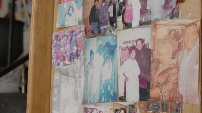 Memorabilia and photos line the walls of Watts Coffee House. | Still from "Broken Bread" Watts