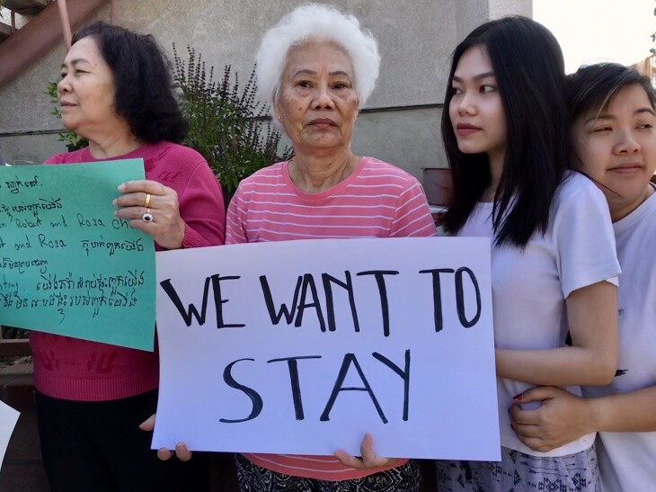 Dieu Pham, 70, takes part in an anti-eviction protest outside her apartment building in August 2019. A new owner is trying to evict the tenants now. | Josie Huang/LAist