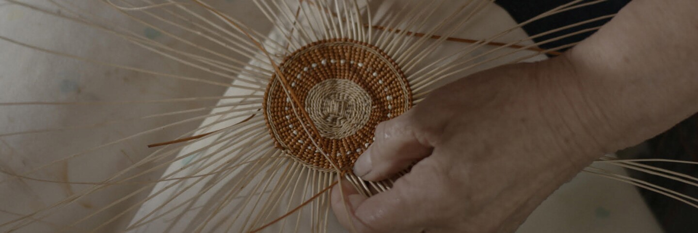 Wilverna Reece (Karuk) weaves a twined basket | Matthew Whalen
