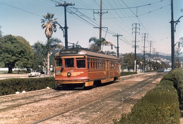 A Pacific Electric Hollywood car travels down the median of Santa Monica Boulevard in Beverly Hills. Courtesy of the Metro Transportation Library and Archive.