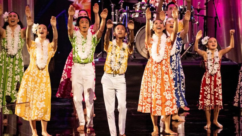 Hawaiian hula dancers Hālau Hula Keali’i o Nālani perform alongside GRAMMY® award-winner Daniel Ho at a previous L.A. COUNTY HOLIDAY CELEBRATION. Photo courtesy of The Music Center.