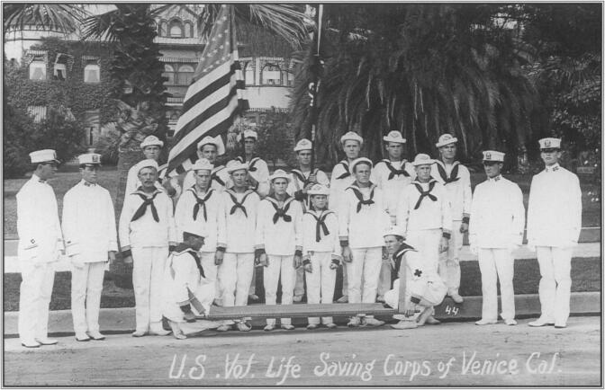 Deservedly proud of the U.S. Volunteer Life Saving Corps of Venice, Captain George Freeth, standing at the far left, reviews his crew in 1909. Courtesy Los Angeles County Lifeguard Trust Fund, Elayne Alexander Collection.