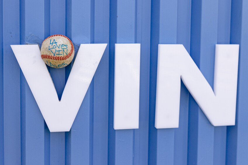 The letters VIN is written in white against a blue background with a baseball that says "L.A. loves Vin."
