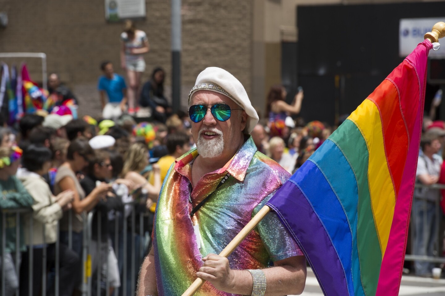 Pride rainbow flag creator Gilbert Baker marches during the 2015 San Francisco Pride Parade on June 28, 2015 in San Francisco, California. | Photo: Arun Nevader/Wire Image