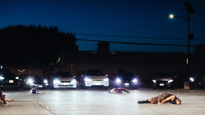 Thirty-five cars formed a circle around dancers in "Parked." | Matthew Brush