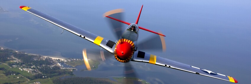 P-51 Mustang in flight during an air show at Langley Air Force Base, in Virginia. | Wikimedia Commons/ U.S. Air Force