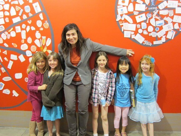 Olga Koumoundouros with <em>Wall Works</em> participants. | Photo: Courtesy Santa Monica Museum of Art.
