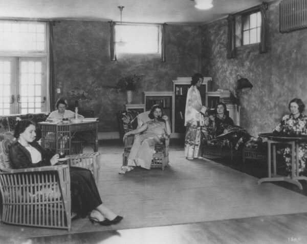 Female athletes lounging at Chapman Park Hotel | Photo courtesy of the Los Angeles Public Library