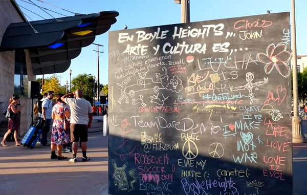 A community chalkboard was provided by Self-Help Graphics