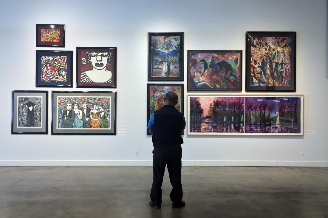 Museum goer at “Papel Chicano Dos: Works on Paper, from the Collection of Cheech Marin” | Ed Fuentes