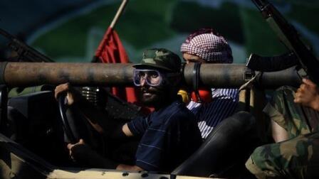 Hunt for Gadhafi Intensifies, New Battles Rage in Tripoli