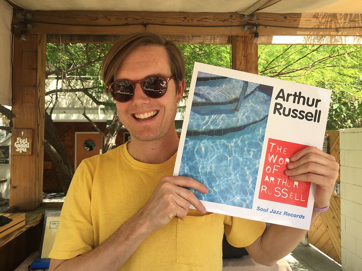 Mark “Frosty” McNeill holding "The World of Arthur Russell" by Arthur Russell | Courtesy of Mark “Frosty” McNeill