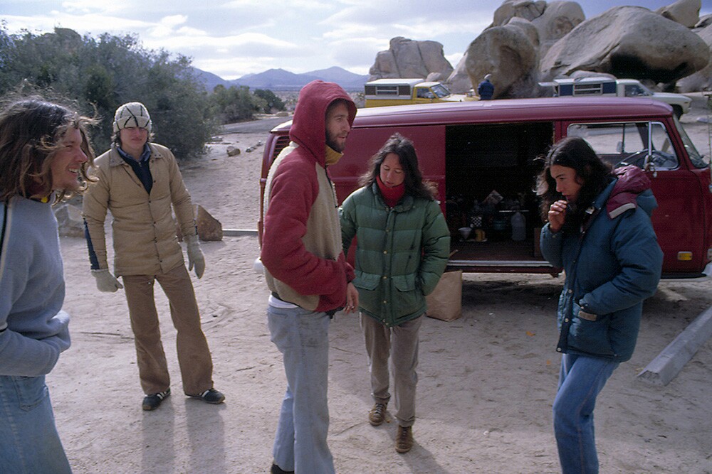 (Left to right): John “Yabo” Yablonsky, unknown individual, Dean Fidelman, Jessica and Mari Gingery with John Bachar's red van in the background. | © Brian Rennie/Benchmark Studios (1978 - 2017)
