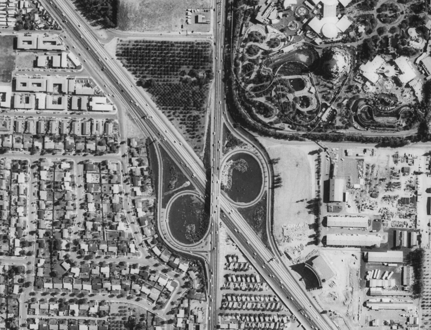 Aerial view of the Disneyland and the Santa Ana Freeway's Harbor Boulevard interchange, circa 1965