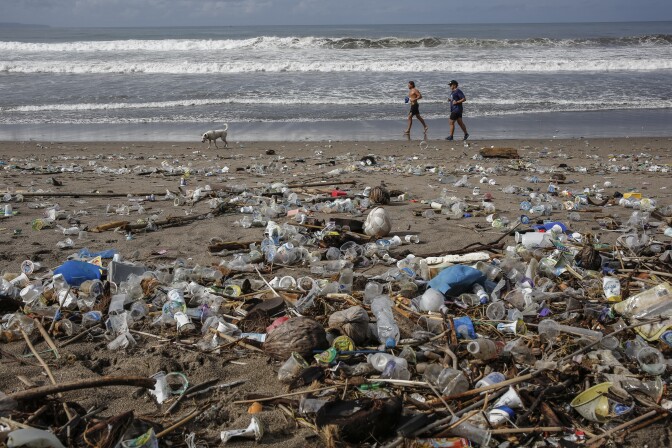Plastic trash on Berawa Beach, Bali, Indonesia.