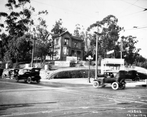 The Foy House on the intersection's northwest corner in 1919. Courtesy of the Title Insurance and Trust, and C.C. Pierce Photography Collection, USC Libraries.