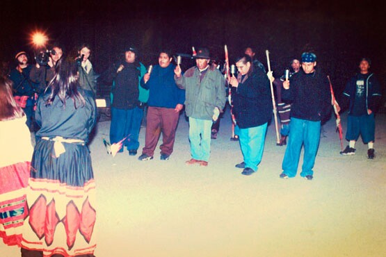 Quechan Lightning Singers and dancers at front line of occupiers blocking police from entering Ward Valley, February 13, 1998. | Photo: Greenaction.