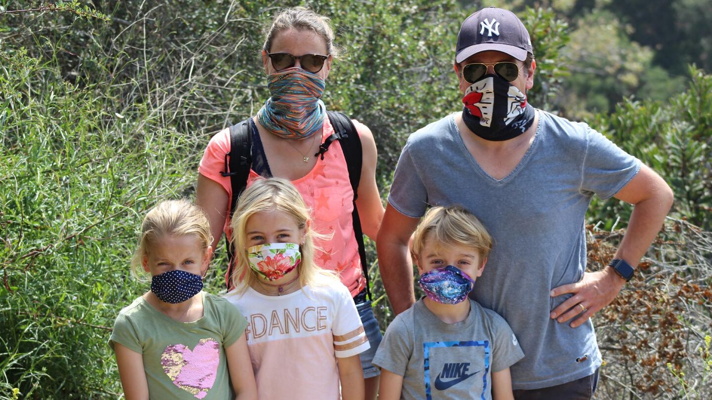 Maria and Christian Ditter with their three children on a hike in Temescal Canyon. | Karen Foshay