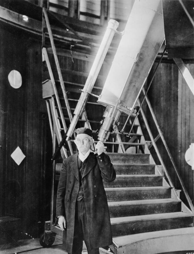 An archival black-and-white photo of Edgar Lucien Larkin inside the Lowe Observatory on Echo Mountain.