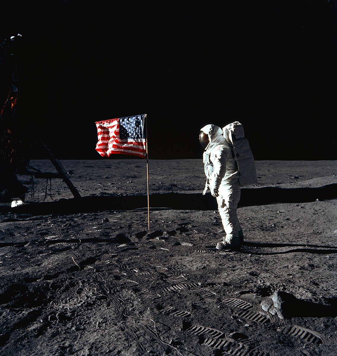 Astronaut Edwin E. Aldrin Jr., lunar module pilot of the first lunar landing mission, poses for a photograph beside the deployed United States flag during Apollo 11 extravehicular activity (EVA) on the lunar surface. | Flickr/NASA Johnson/Creative Commons (CC BY-NC 2.0)