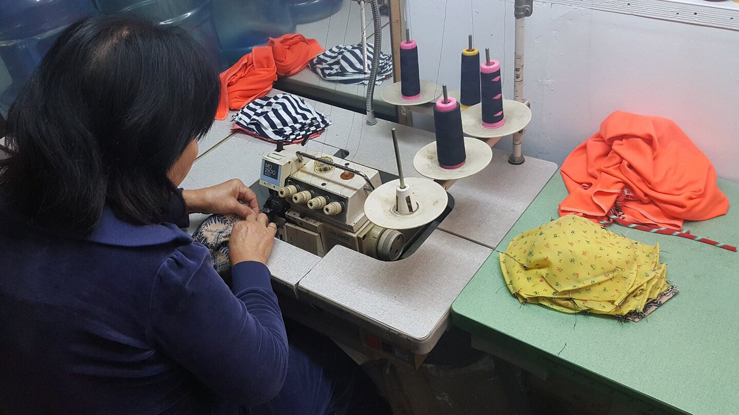 Uncle Van Huynh's mother sews masks for the Auntie Sewing Squad. | Courtesy of Van Huynh