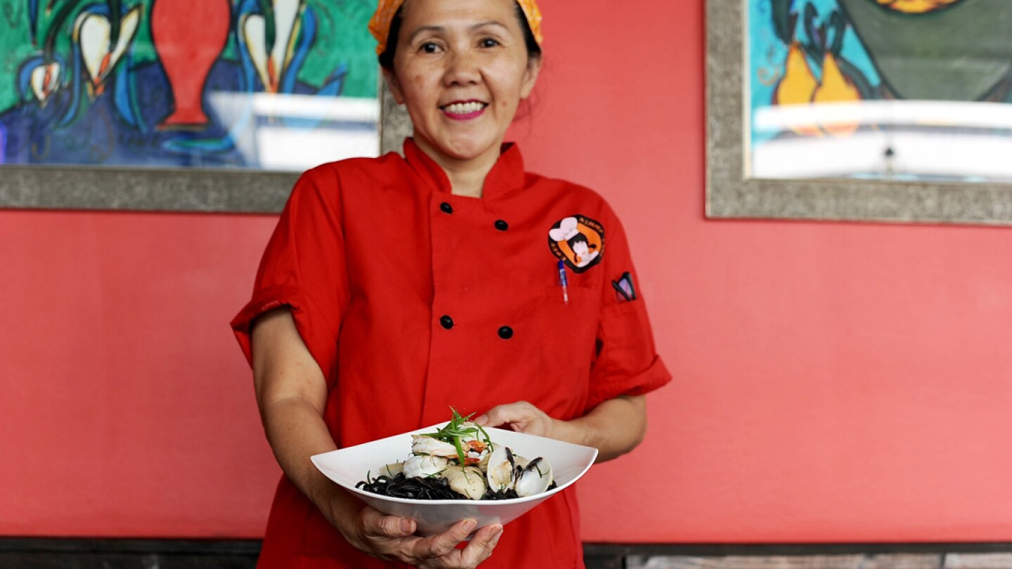 Chef Kimmy Tang Holding Squid Ink Pasta | Eddie Lin